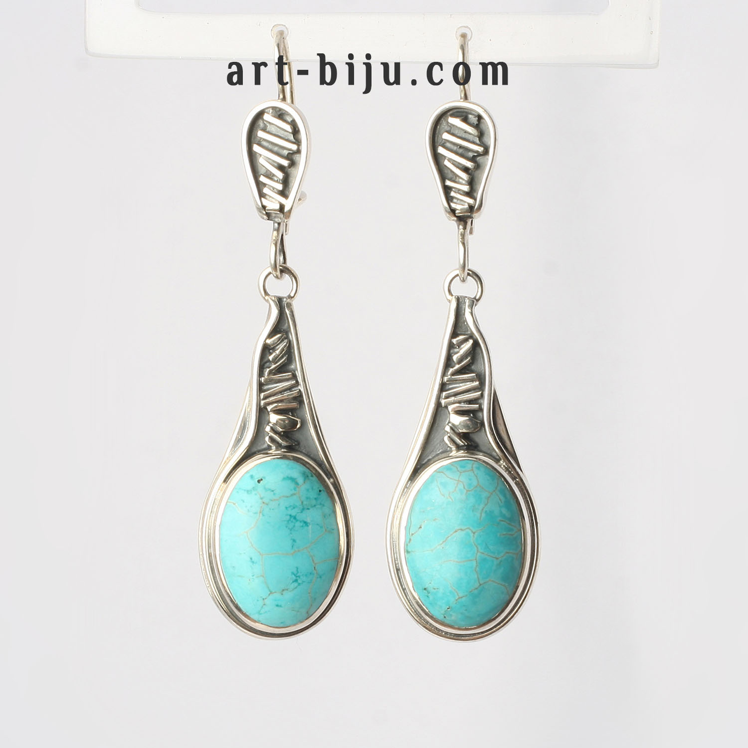 Boucles d'oreilles en argent avec turquoise.